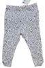 Nye Fixoni beige småblomstrede leggings str. 74